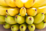 Fototapeta  - Bunch of ripe bananas background. Fresh fruits background.