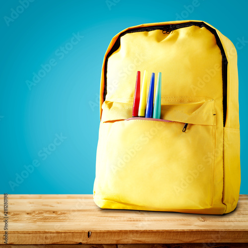 School Backpack On Wooden Board And Free Space For Your