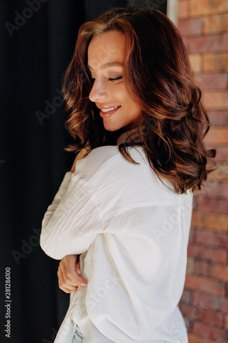 Lovable Woman With Dark Hair Tanned Skin And Wonderful Smile