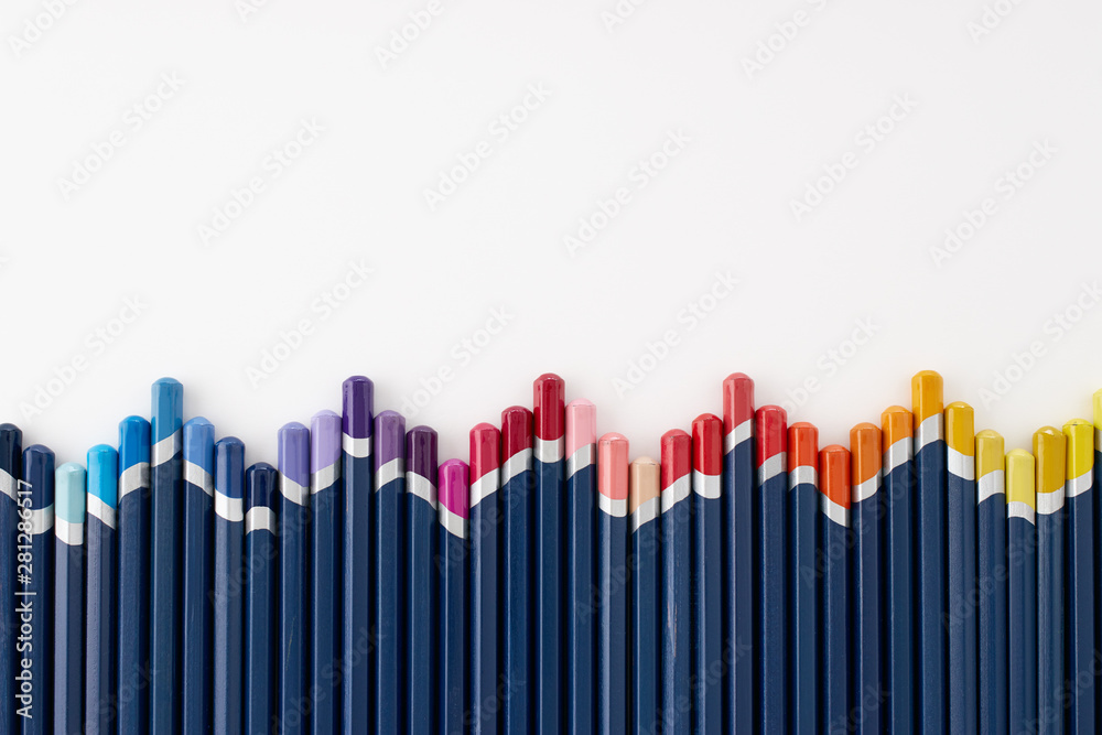 Arrangement of colored pencils - obrazy, fototapety, plakaty 