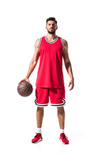 Handsome Athletic Basketball Player In Red Uniform With Ball Isolated On White