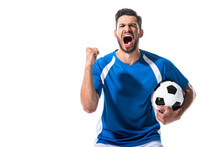 Excited Soccer Player With Ball And Clenched Hand Yelling Isolated On White