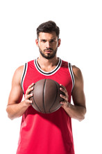 Sportive Basketball Player Holding Ball And Looking At Camera Isolated On White
