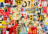 Collage of many numbers and letters ripped torn advertisement street posters grunge creased crumpled paper texture background placard backdrop surface