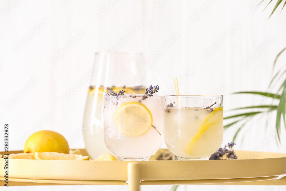 Glasses with lavender lemonade on table