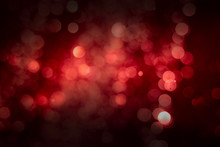 Abstract Red Background With Soft Blur Bokeh Light Effect.