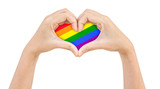 Fototapeta Tęcza - Hand heart shape for campaign LGBTQ symbol for lesbian, gay, bisexual, transgender and queer or questioning on isolated background.