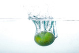 Fototapeta Łazienka - Falling Mango Into Clean Water 