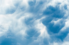 Details Of Big Cumulonimbus Cloud In Blue Sky.