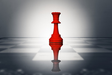 One chess pieces staying against thel set of chess pieces. Strategy, business concept