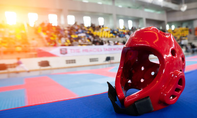 TaeKwonDo Hear Guard put on International Competition as background sport event in huge Gymnasium high roof top with color seats and flags