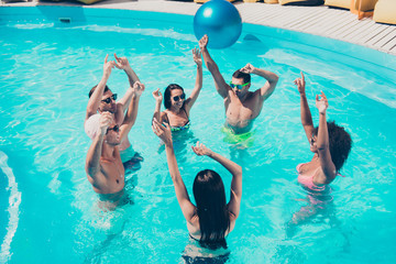 Canvas Print - Photo of six multinational friends hanging out in water enjoying best company and pool discotheque