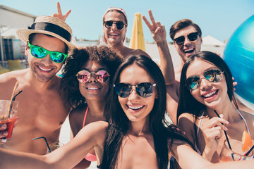 Sticker - Close up photo of charming brunette students photographers making photos moments v-signs wearing eyeglasses eyewear in recreation