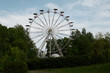 An old metal ferris wheel without people