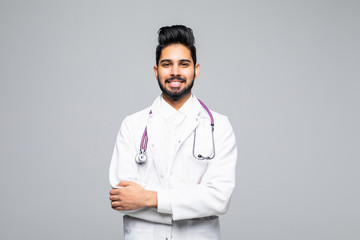 Indian male doctor crossed arms on the white background