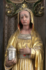 Statue of Saint on the main altar in the Church of Saint Mary Magdalene in Cazma, Croatia