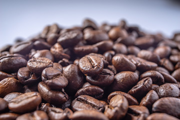 Coffee Beans Background. Close Up fresh roasted brown