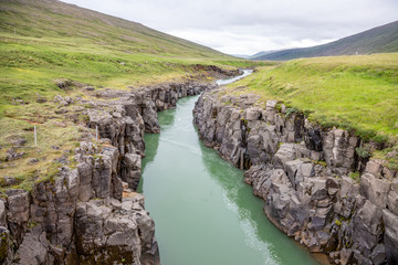 a river in the lava landscape of Iceland.