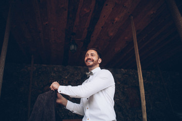Wall Mural - stylish groom getting prepared for wedding