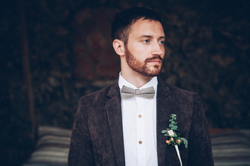Wall Mural - stylish groom getting prepared for wedding