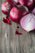 Red Onions On Rustic Wood. Red Onion Halves. Food Ingredients