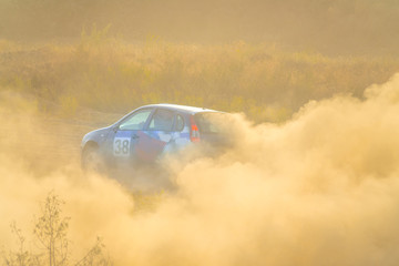 Wall Mural - Color Rally Car Passes Turn