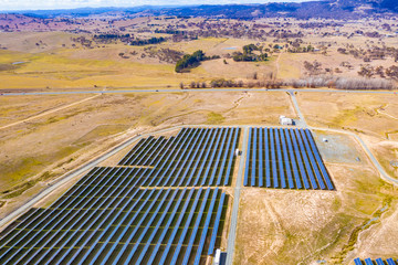 Wall Mural - aerial view of a large solar farm for renewable energy supply in canberra, australia