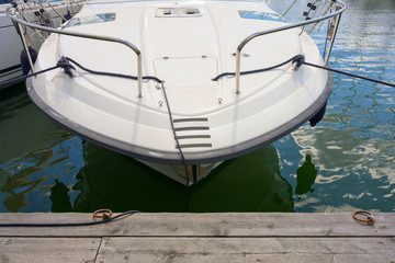 Wall Mural - Luxury Yacht parking at the wooden pier on the water