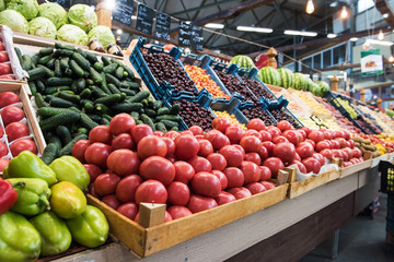 Vegetable farmer market counter: colorful various fresh organic healthy vegetables at grocery store. Healthy natural food concept