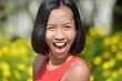 © dtiberio - Young Asian Woman Laughing
