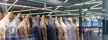 Clothes Shop Costume Dress Fashion Store Style Concept Jackets For Men And Hangers In A Shop Window
