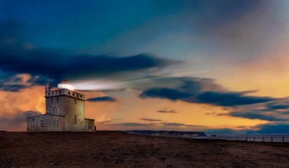 Wall Mural - The Dyrhólaey Lighthouse (Icelandic: Dyrhólaeyjarviti) is a lighthouse located on the central south coast of Iceland.