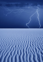 Thunderbolts Of Lightning Over Desert At Night
