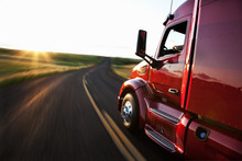 Commercial Truck Driving On Highway