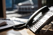© Mint Images - Close up of telephone on desk in office