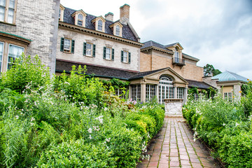 Wall Mural - stone path with bushes leading up to a mansion