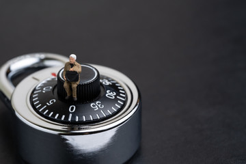 Aufkleber - security, information safety or user privacy concept, miniature people businessman in suit holding s