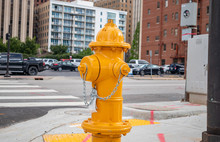 Fire Hydrant Yellow Color In The City Center, Sunny Day