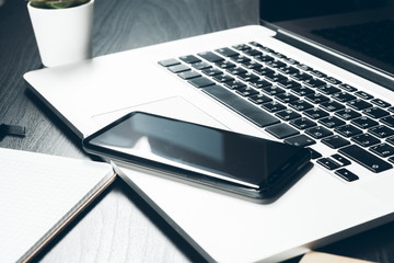 Canvas Print - Smartphone and computer keyboard on office table close up