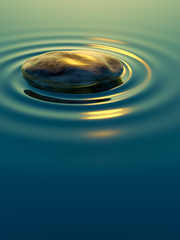 Wall Mural - pebble stone in water with ripples background