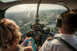 canvas print picture - Portrait of beautiful blonde women and pilot enjoying helicopter flight. She is amazed by cityscape.