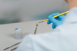 © StudioLaMagica - painting tooth crown in dental laboratory