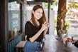 © tonefotografia - Beautiful asian woman is drinking coffee