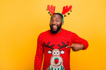 Wall Mural - Portrait of his he nice attractive lovely cheerful cheery positive funky guy wearing Santa outfit showing style isolated over bright vivid shine yellow background