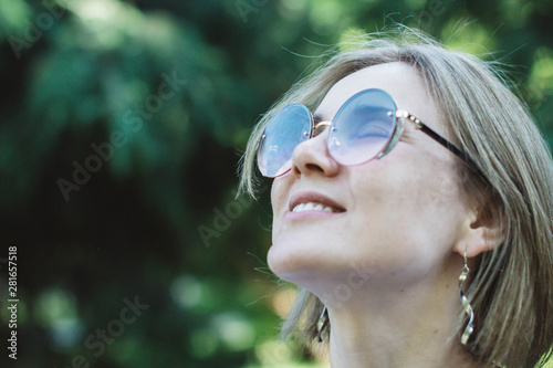 Portrait Of A Cute Charming Blonde With A Short Haircut And
