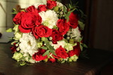 Fototapeta Kwiaty - white and red bouquet for wedding birthday celebration with red roses