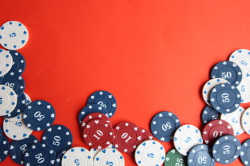 poker cards, pocker chips, money, pocker dice on red background. gambling, board games