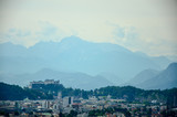 Fototapeta Do pokoju - Salzburg City and Alps hills in background, white edit space
