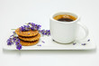 Morning cup of coffee and sweets and lavander decoration