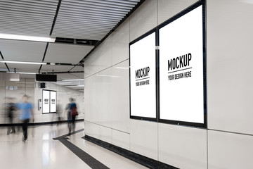 blank billboard located in underground hall or subway for advertising, mockup concept, low light spe